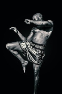 mma fighter with leg up